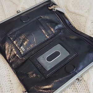 Hobo
Lauren Croc Embossed Leather Clutch
Color: Black Lizard
MSRP: $168.00!